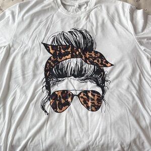 White Graphic Tee with Leopard Print Design